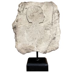 Egyptian figurative limestone architectural fragment 