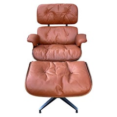 Restored Herman Miller Eames Lounge Chair and Ottoman in Rosewood