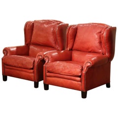 Pair of Mid-Century French Red Leather Wing Back Club Armchairs with Nail Heads