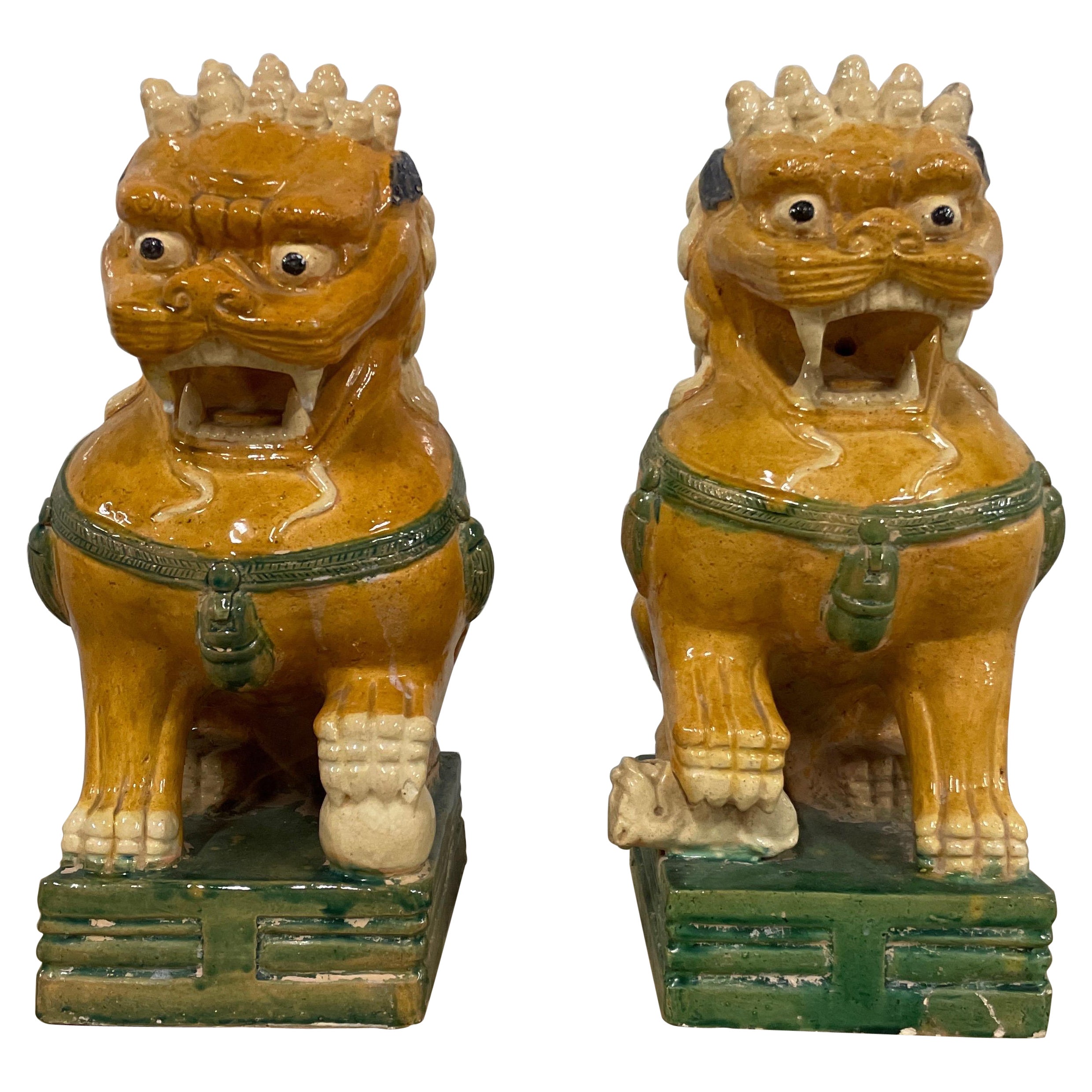 Large Pair of Multicolored Glazed Terra Cotta Foo Dogs For Sale