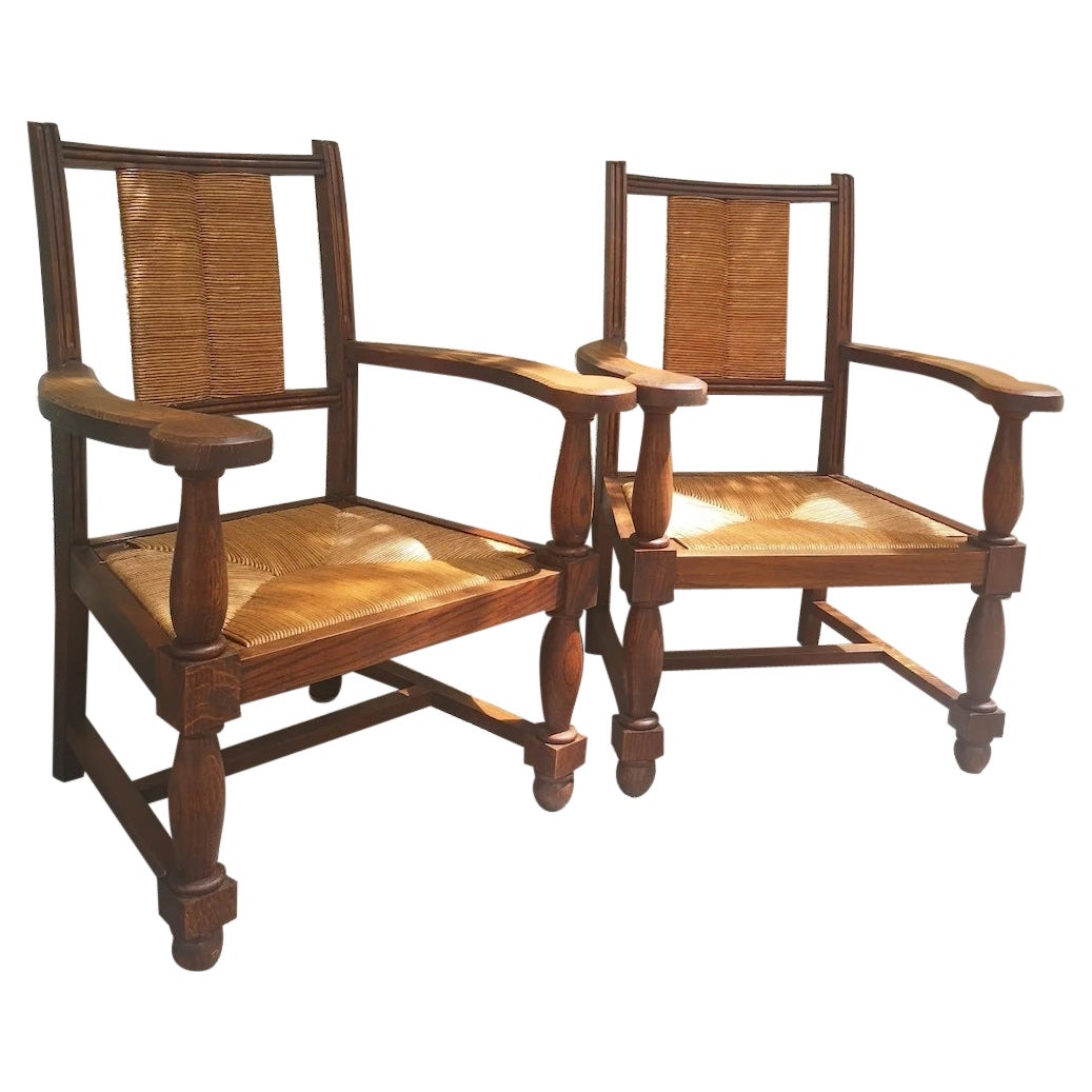 set of 2 oak armchairs and straw seat circa 1940