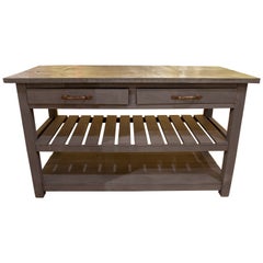 Table de cuisine en bois avec plateau en métal, tiroirs et deux étagères inférieures