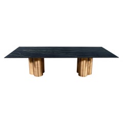 Custom Modern Porcelain Dining Table with Antiqued Brass Clover Pedestals