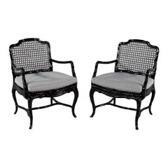 Retro Pair of Black Lacquered Cane Back Lounge Chairs