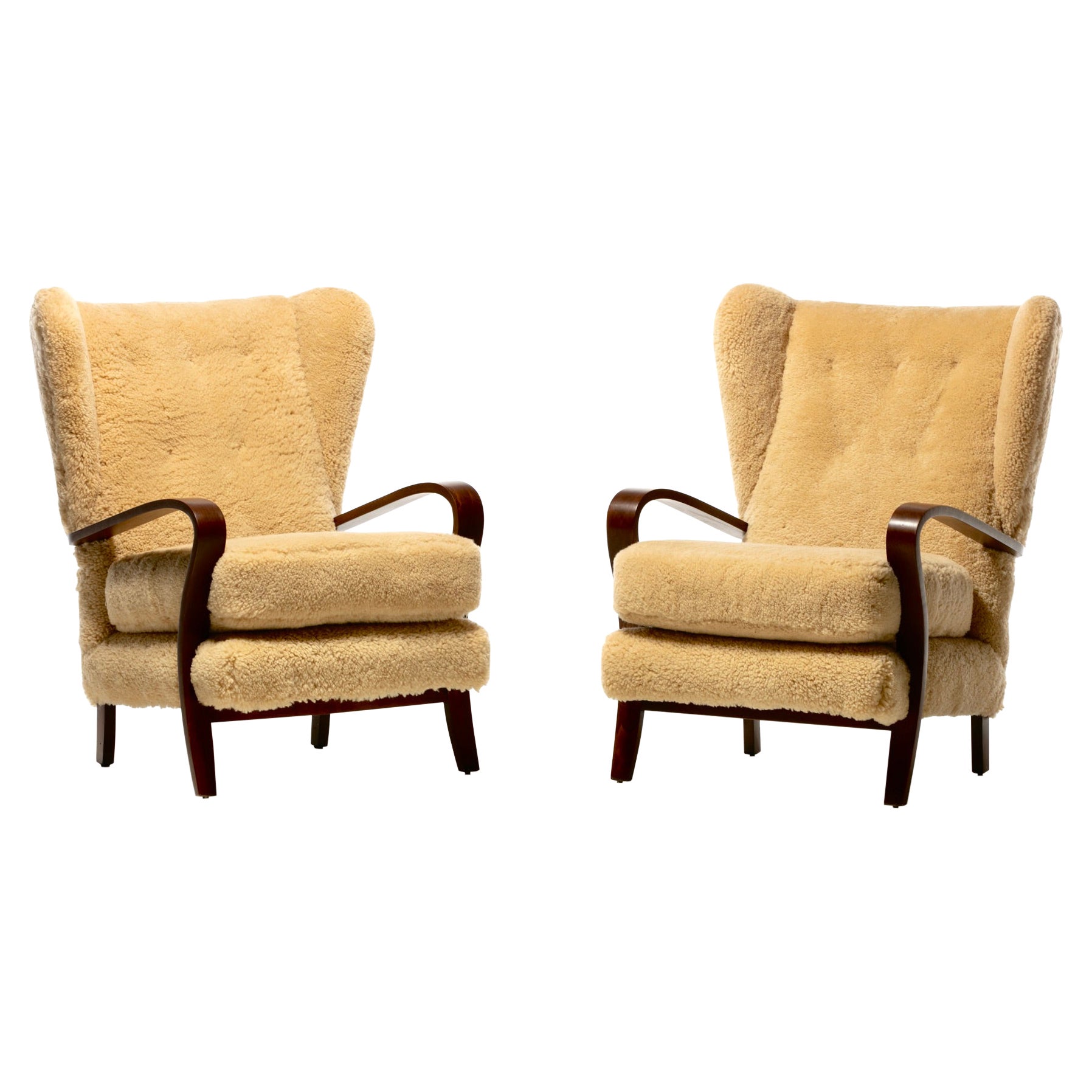 Italian Mid Century Wingback Chairs in Hand Sewn Champagne Shearling c. 1960 For Sale