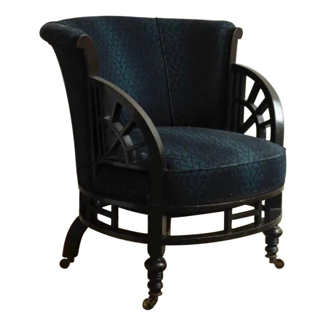 Ebonised Tub Chair, in the style of Godwin. For Sale