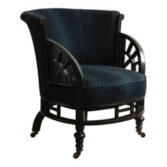 Ebonised Tub Chair, in the style of Godwin.