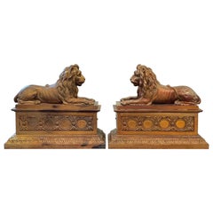 Vintage Regency Recumbent Lion Firedogs Plinth Base, a Pair