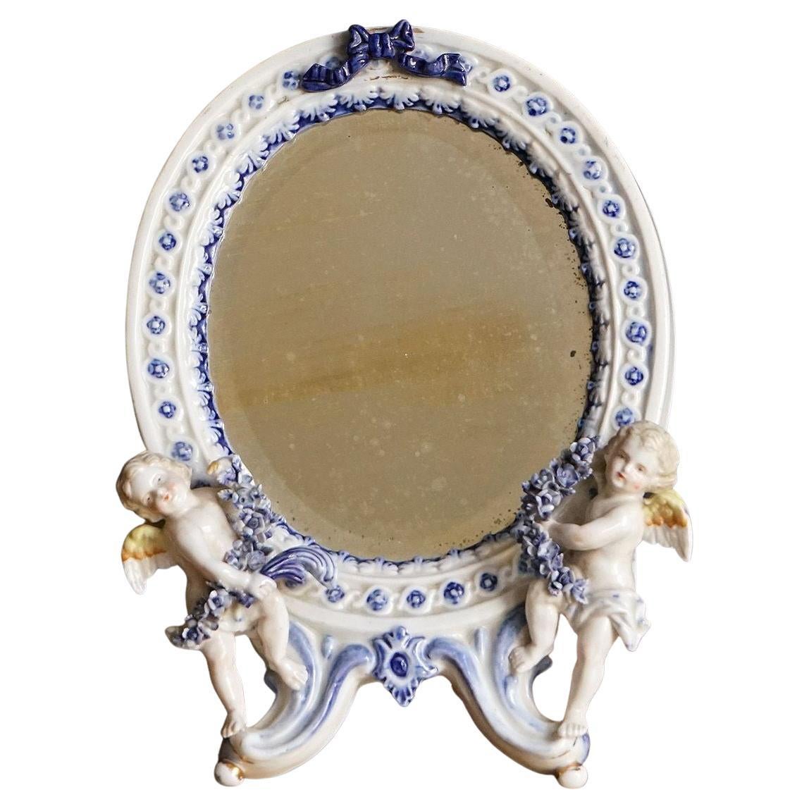 Antique German Porcelain Table Mirror With Cherubs, 19th Century For Sale
