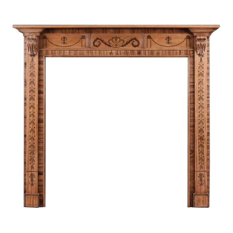 A Small Scale Timber Fireplace in the Regency Style For Sale