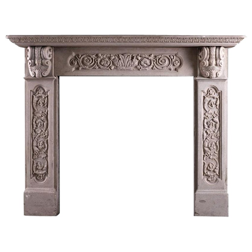 A Carved English Stone Fireplace For Sale