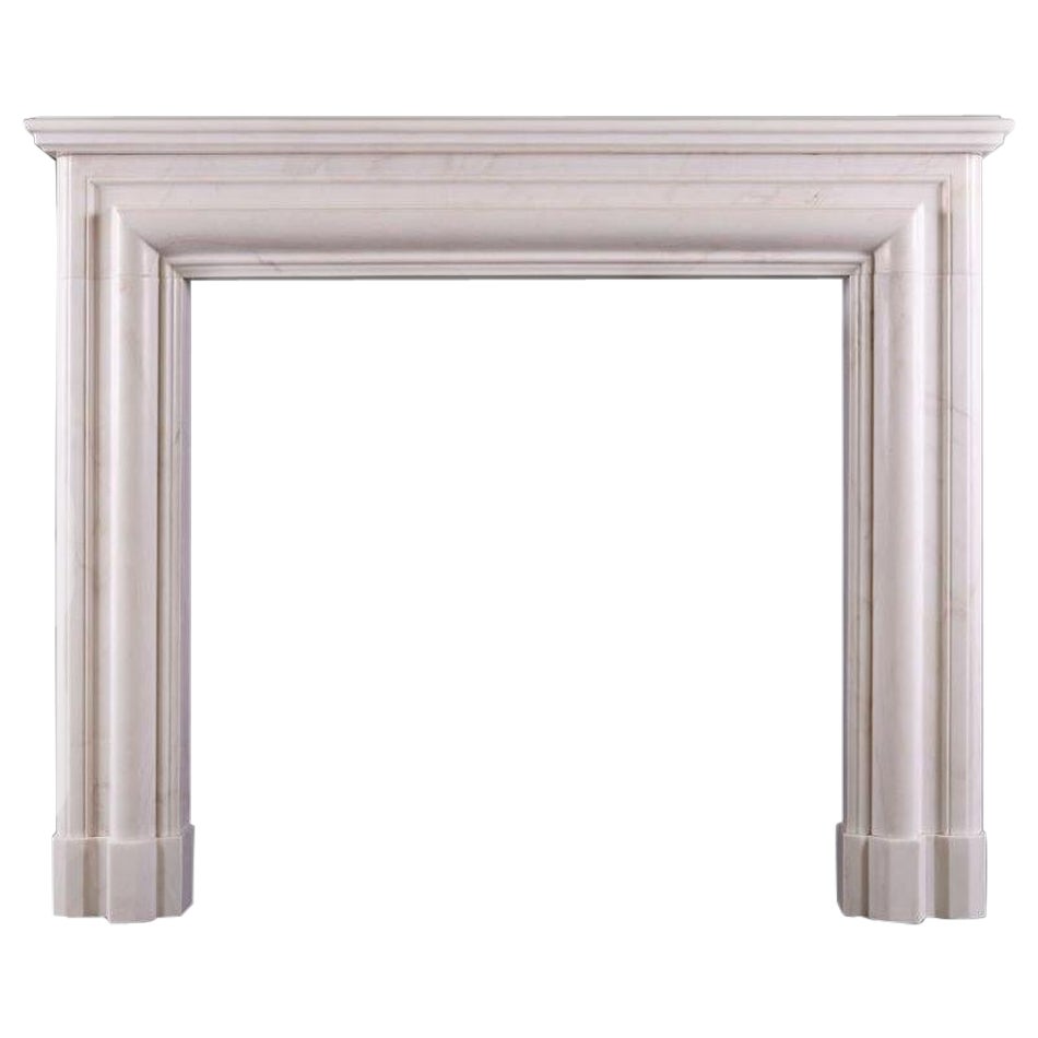 English Bolection Fireplace in White Marble For Sale