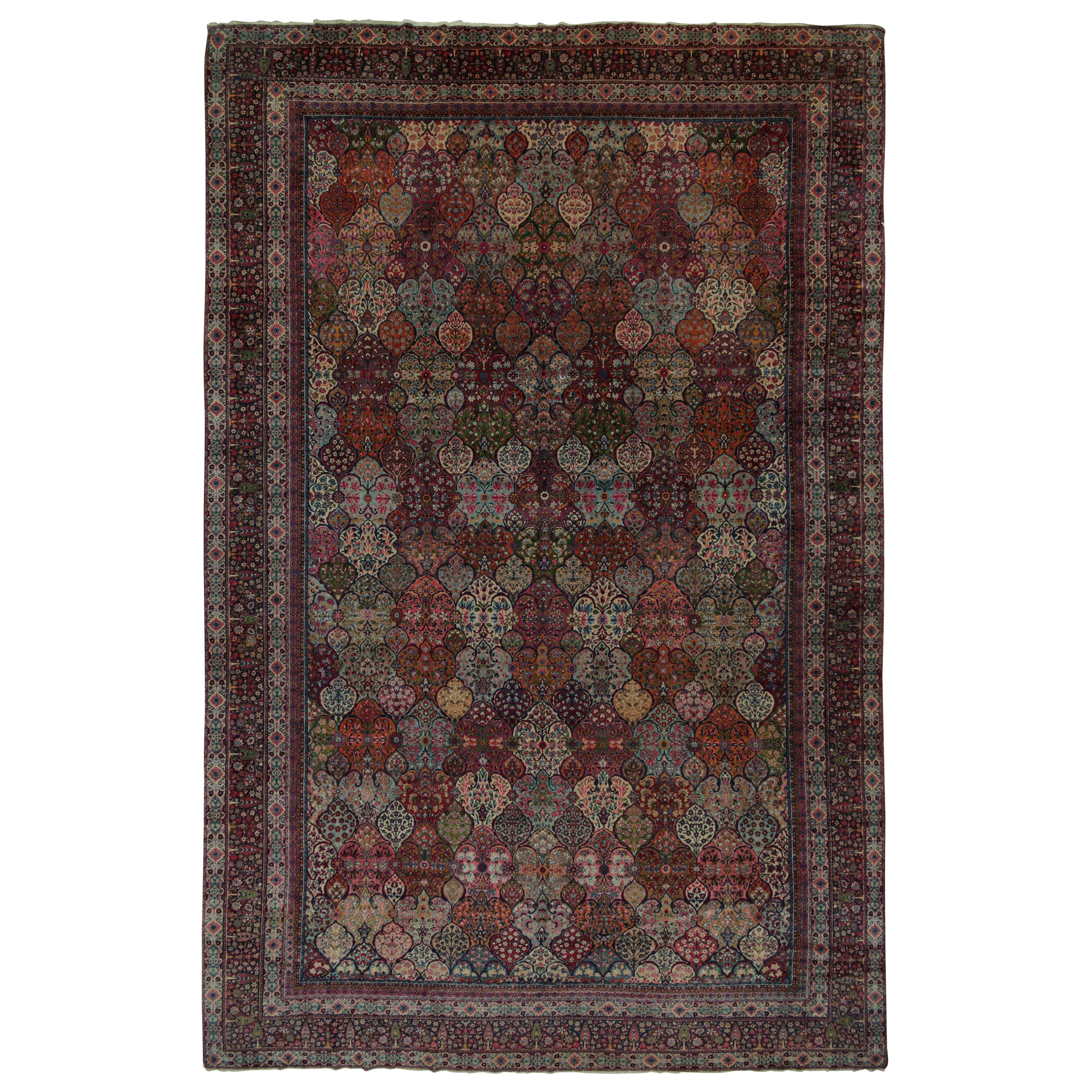 Rare Antique Persian Kerman Rug in Polychromatic Floral Pattern - by Rug & Kilim For Sale
