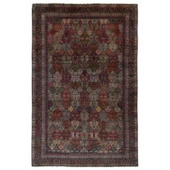 Seltener antiker persischer Kerman-Teppich in polychromem Blumenmuster von Teppich & Kilim