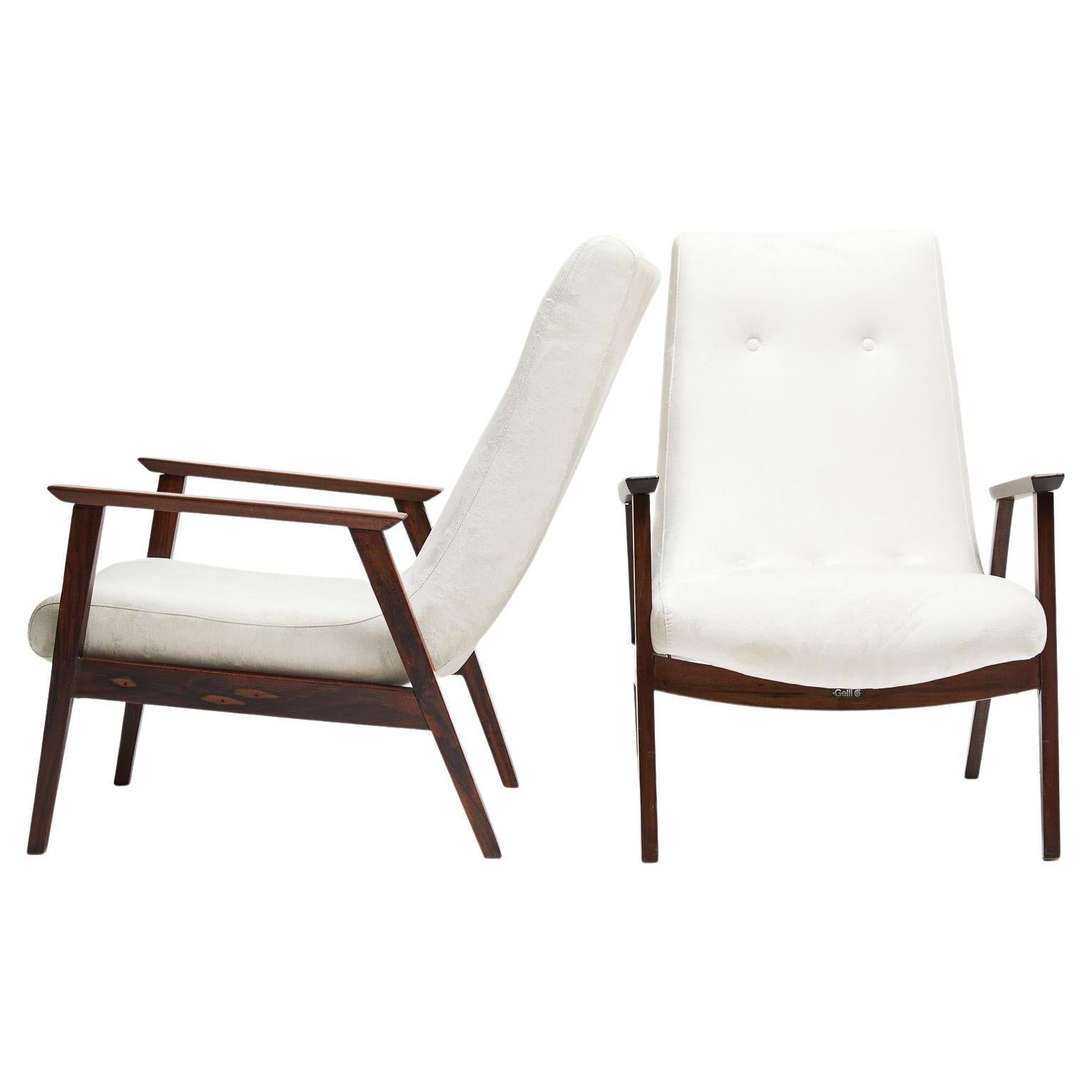 Available today, these Mid-Century Modern armchairs in hardwood & white Suede by Gelli in Brazil are gorgeous!

These super comfortable armchairs are made of hardwood and white suede. The structure is made of Brazilian hardwood and the