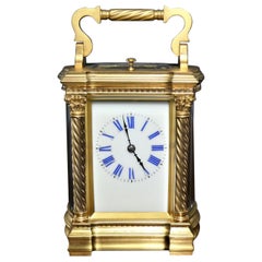 Reloj de carruaje de repetición ornamentado francés dorado