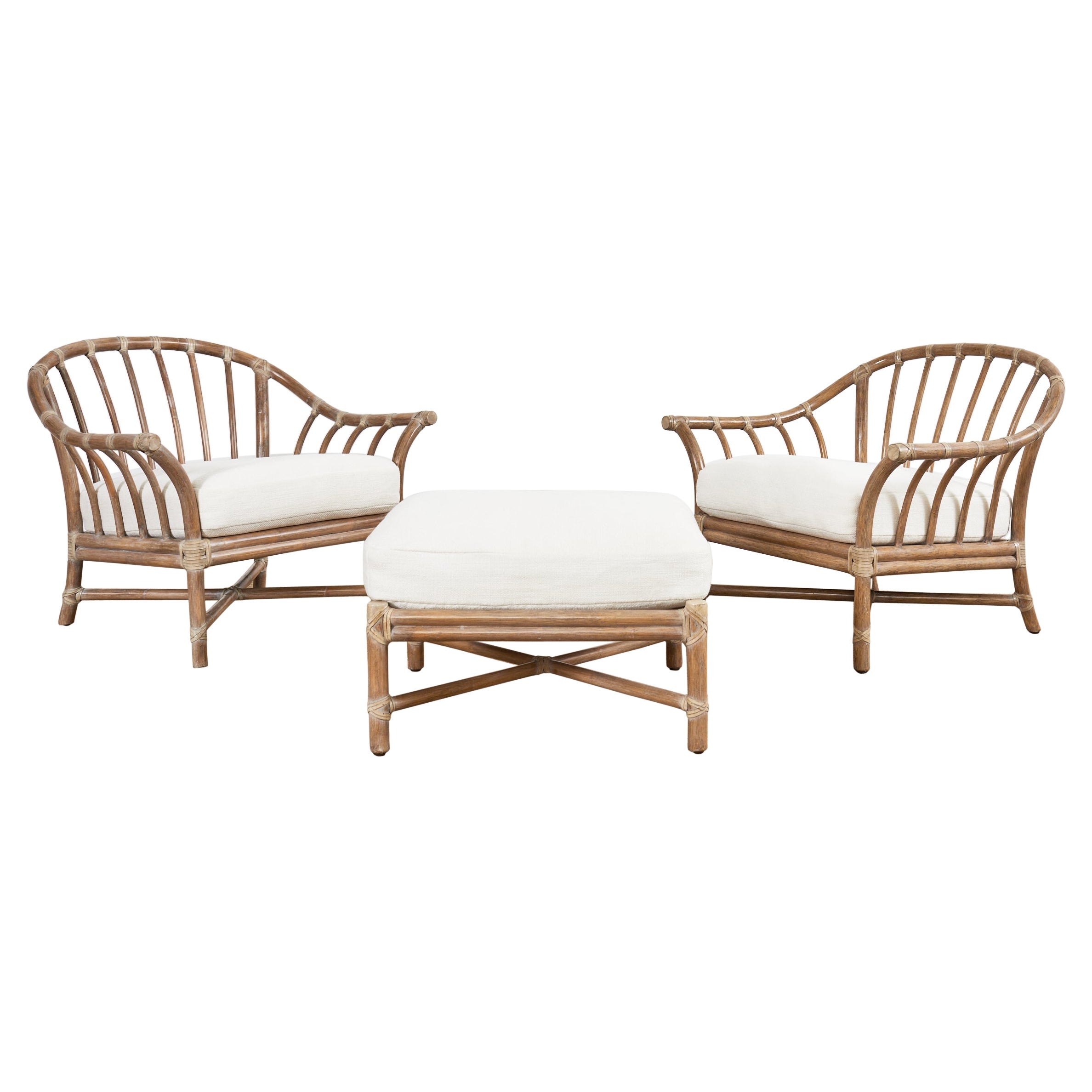 Pair of McGuire Cerused Rattan Lounge Chairs and Ottoman