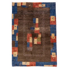 Tapis persan moderne Gabbeh en laine marron fait à la main à motif géométrique