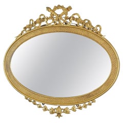 Large and Fine Quality Early 19th Century Oval Giltwood Mirror
