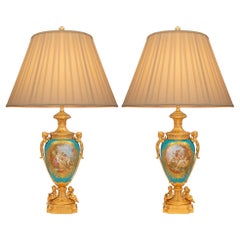 A Pair Of French 19th Century Louis XVI St. Ormolu And Sèvres Porcelain Lamps