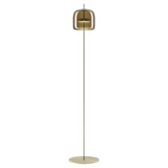 Lampadaire Jube de Vistosi en verre transparent terre brûlé et finition dorée mate