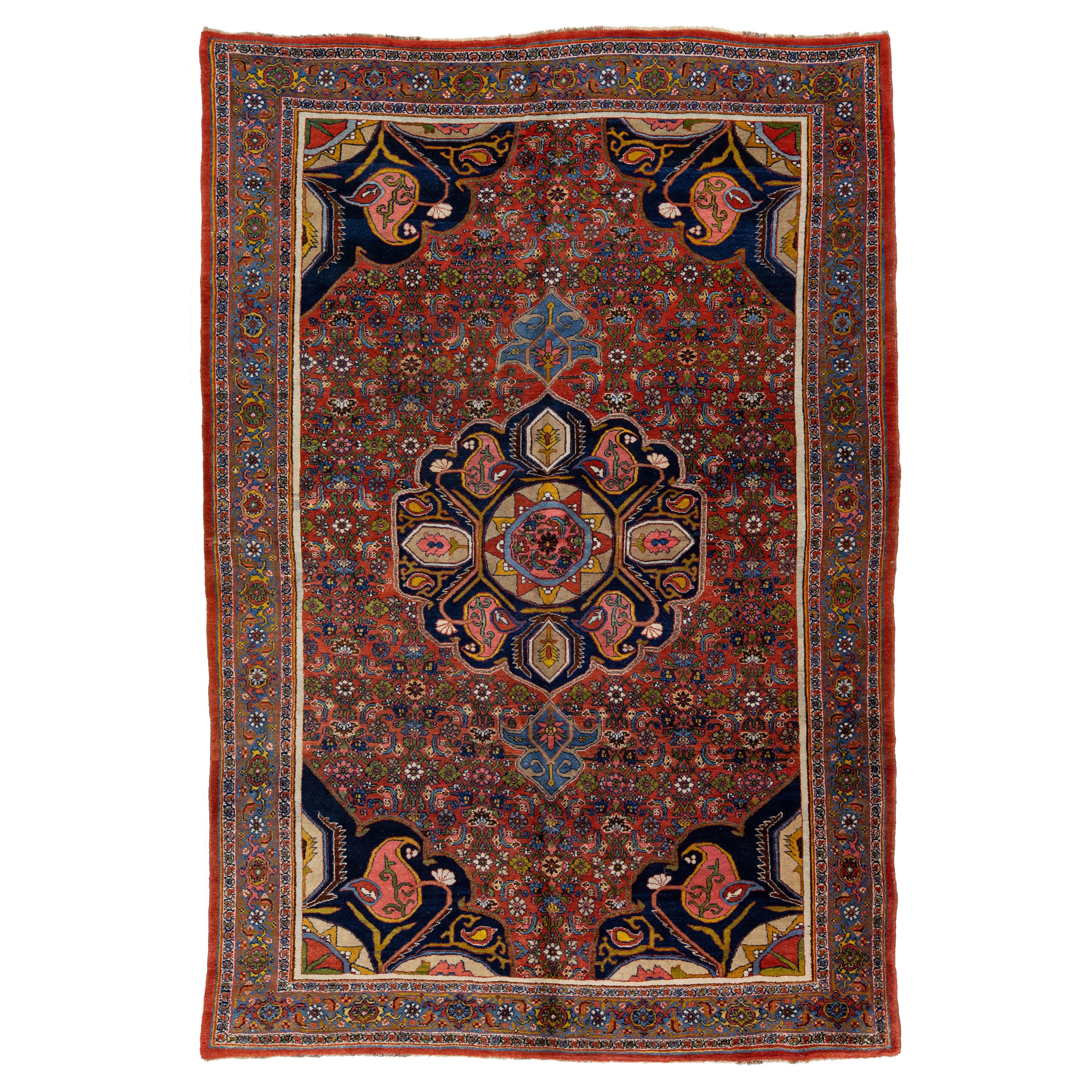 Ancien tapis Bidjar rouge en laine persane fait  la main avec motif floral en mdaillon