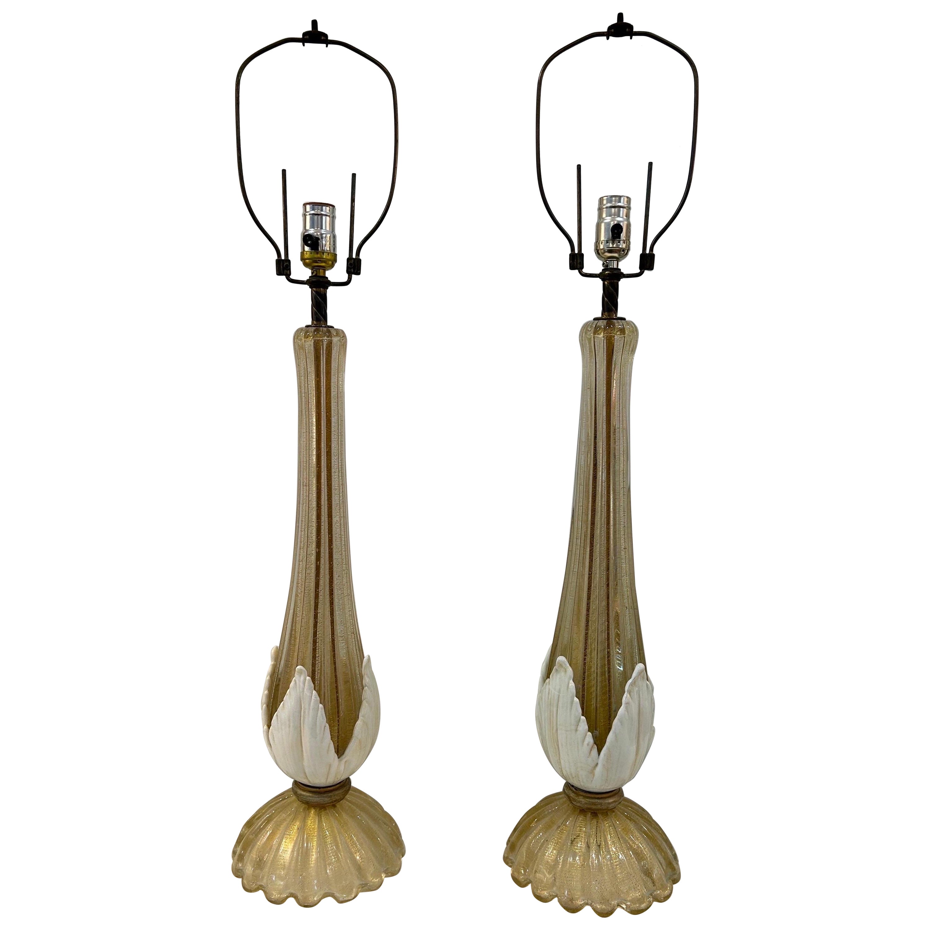 Pair of Hollywood regency Murano lamps .