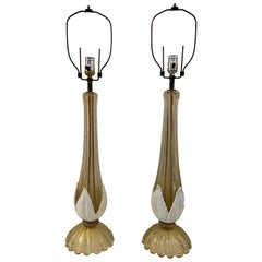 Pair of Hollywood regency Murano lamps .