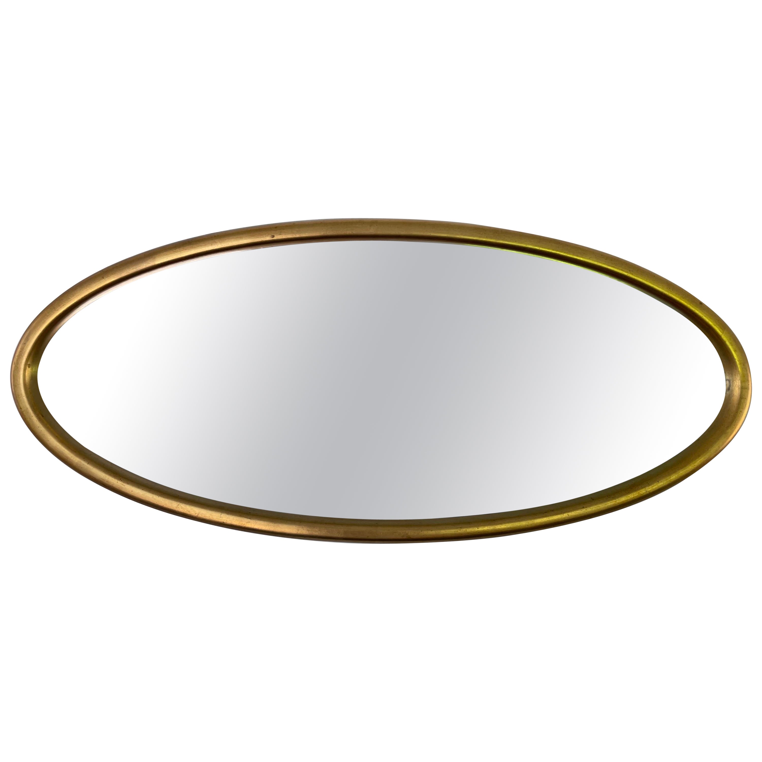 Miroir ovale du début du siècle avec cadre doré attribué à La Barge