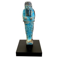 Shabti égyptien en faïence turquoise, monté en musée 