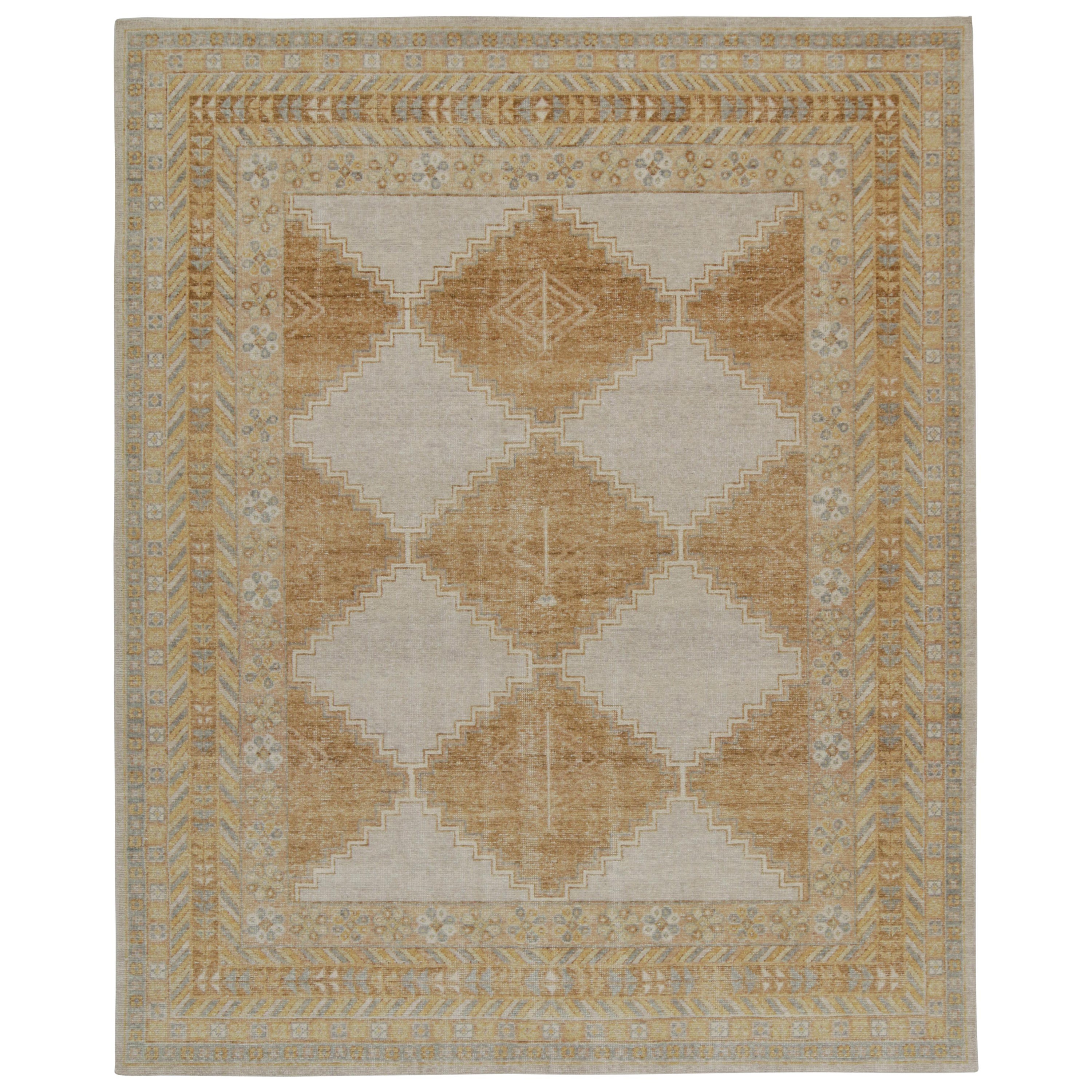 Rug & Kilim’s Distressed Tribal style rug in Gold, Gray and Blue Patterns For Sale
