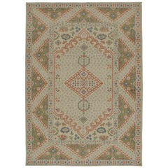 Rug & Kilim’s Distressed Ghiordes Style Rug in Beige with Green & Red Medallion