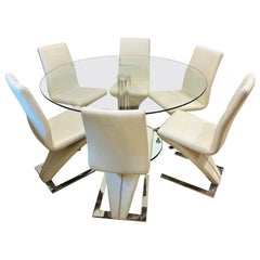 Table de salle à manger ronde en verre d'inspiration designer et 6 chaises de style Rolf Benz