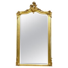 Grand miroir de cheminée doré français du 19ème siècle