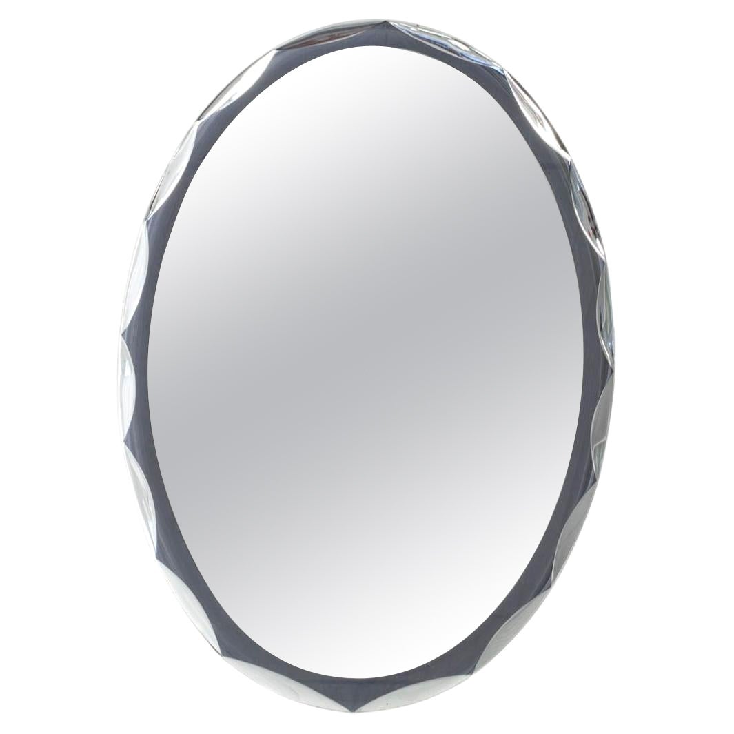 This Oval, Italian Wall Mirror Dates from the 1960s For Sale