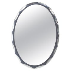 This Oval, Italian Wall Mirror Dates from the 1960s
