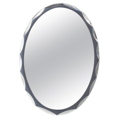 Vintage This Oval, Italian Wall Mirror Dates from the 1960s