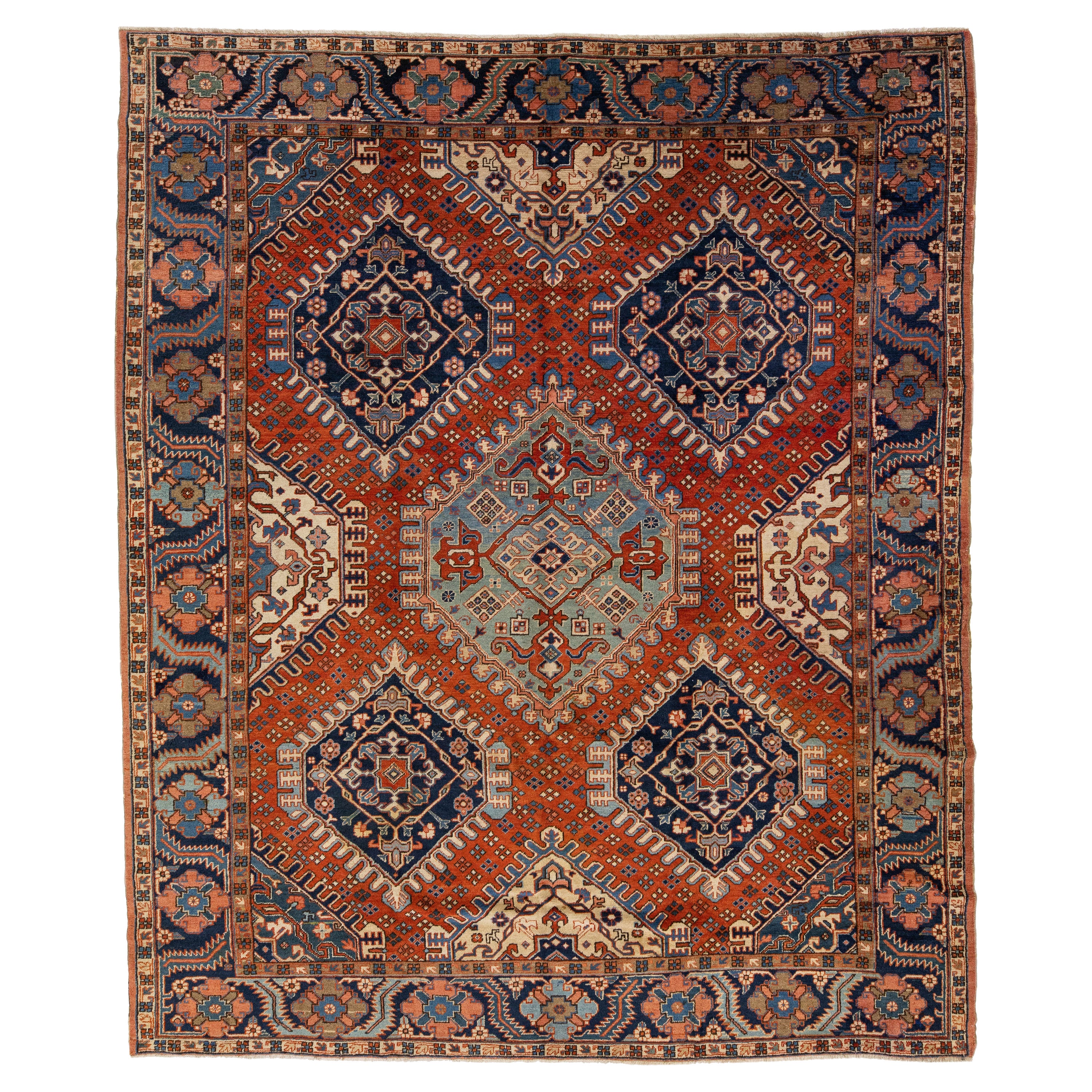  Antique Geometric Persian Heriz Handmade Wool Rug with Orange Rust Field For Sale
