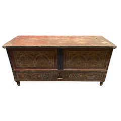 Used Late 19th Century French Red Painted Blanket Chest with Elaborate Decoration