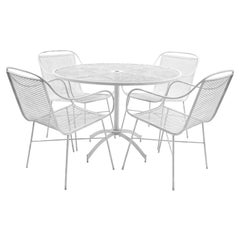 Outdoor Dining Table and Four Arm Chairs by John Salterini