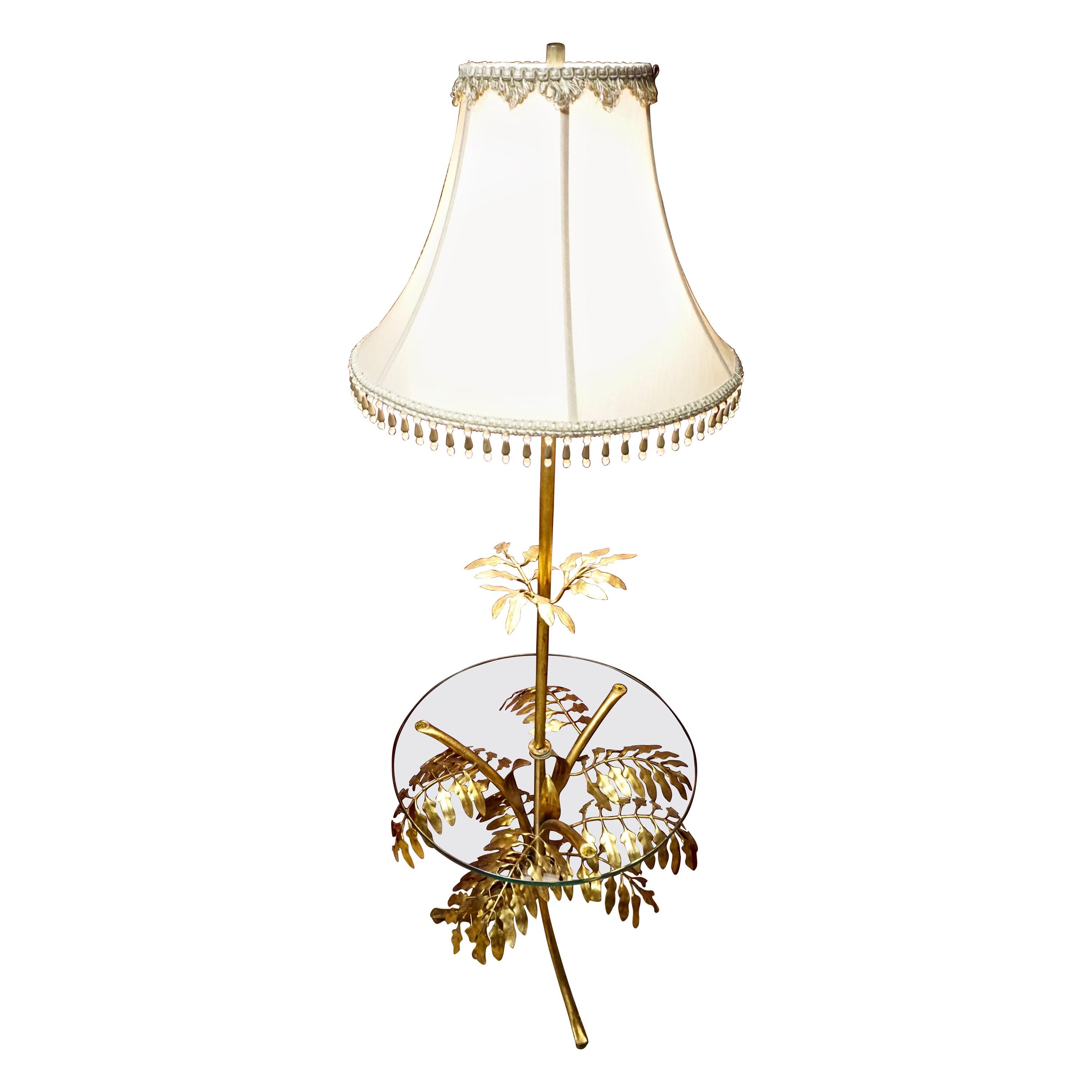 Lampe de plancher sculpturale italienne du milieu du siècle, en métal et feuilles d'or, avec table en verre.