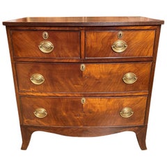 Diminutive Mahogany Bow Front Chest with French Feet, circa 1790