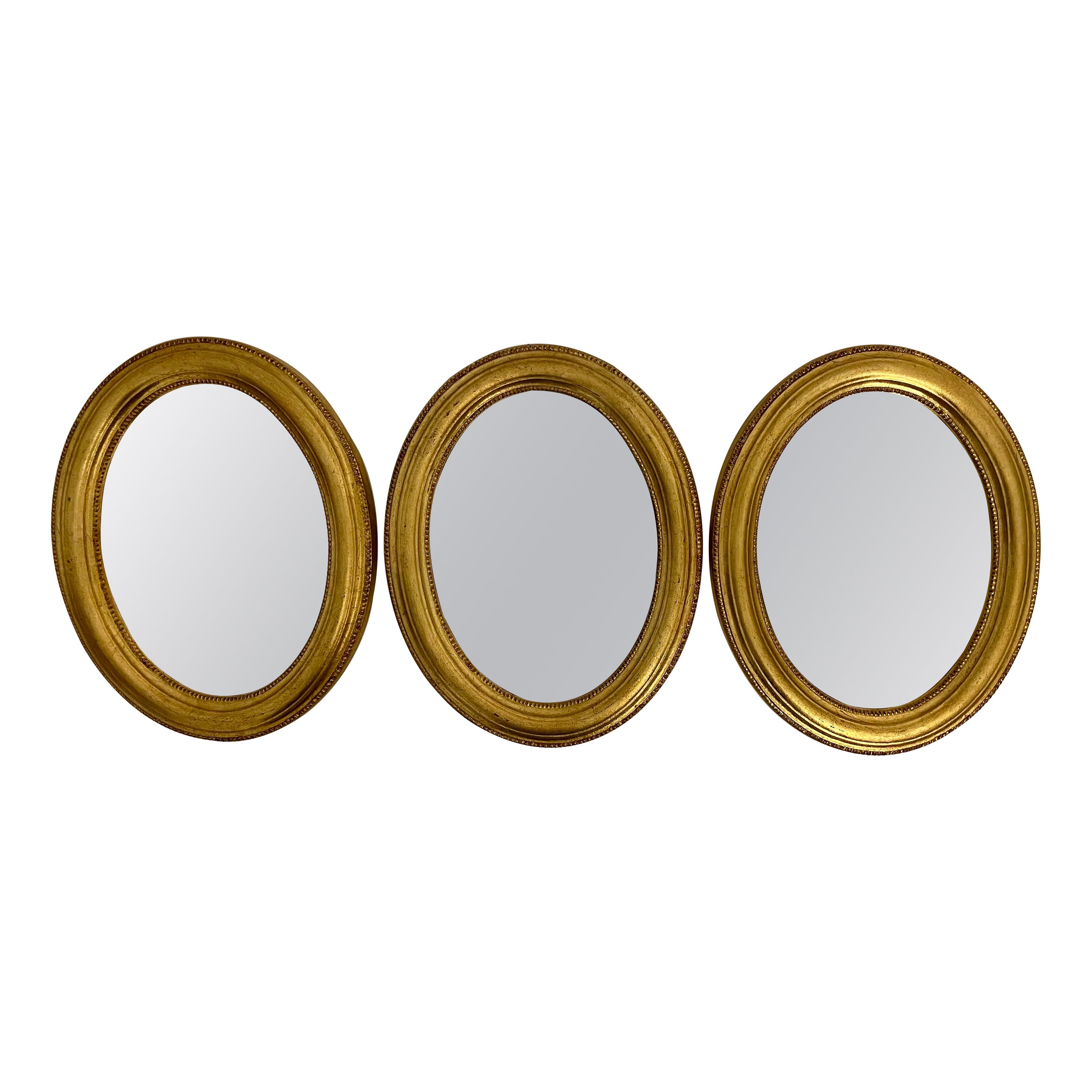 Satz von drei vergoldeten, ovalen italienischen Vintage-Spiegeln