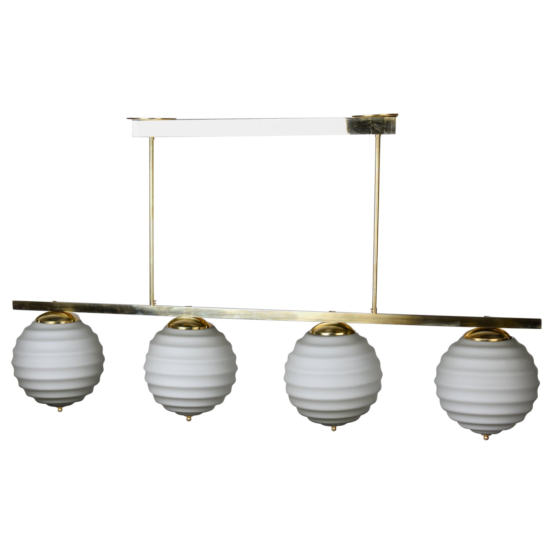 New Italian Fixture with Four Pale Taupe Globes on Horizontal Brass Bar For Sale