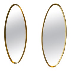 Pair of 1960s Italian Oval Deep Framed Gilt Wood Mirrors