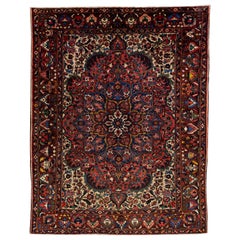 Antique Persian Bakhtiari Red Handmade Wool Rug with Multicolor Rosette Design