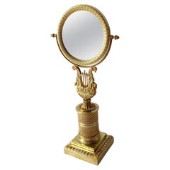 Elegant Empire Table Mirror in Gilded Bronze