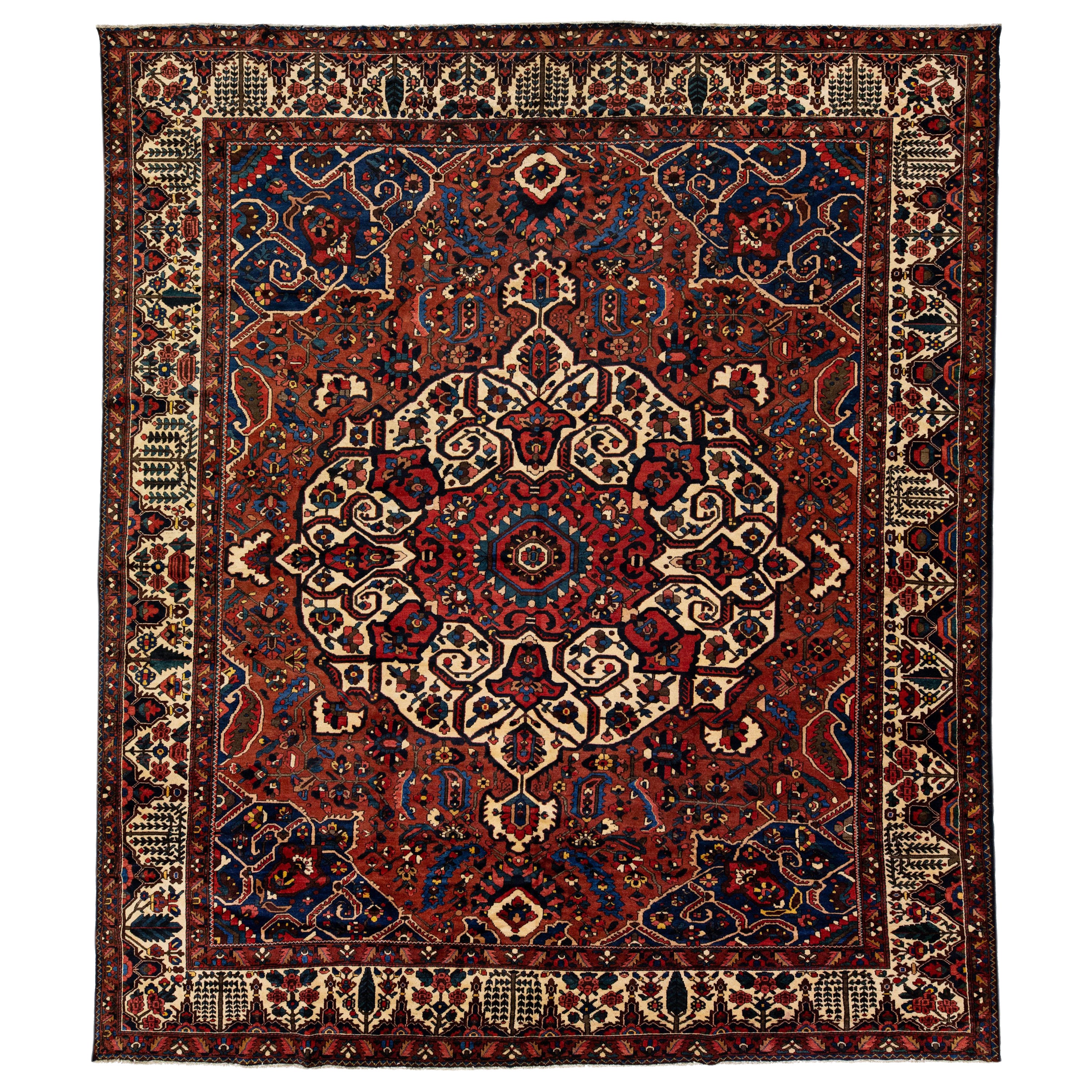 Handmade Rosette Antique Persian Bakhtiari Wool Rug With Red Color Field For Sale