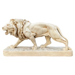 Statue de lion strié en céramique française du milieu du siècle dernier d'après Louis Vidal