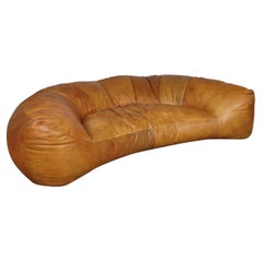 Cognac Leather Croissant Sofa by Raphael Raffel for Honore Paris, 1970s